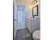 Bathroom with new vanity, countertop, and fixtures, leads to the bright bedroom at 326 Hobart Ave, Daytona Beach, FL 32114