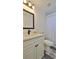 Bathroom boasts a new vanity with quartz countertops, new faucet and modern fixtures at 326 Hobart Ave, Daytona Beach, FL 32114