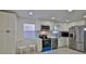 Well-lit kitchen featuring stainless steel appliances, white cabinets, and modern countertops at 326 Hobart Ave, Daytona Beach, FL 32114