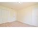 Bright bedroom featuring neutral carpeting and a closet at 345 Feather Pl, Longwood, FL 32779