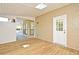 Enclosed patio with wood floors, a door to the exterior, and multiple skylights at 345 Feather Pl, Longwood, FL 32779