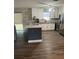 Spacious kitchen with an island, stainless steel appliances, and ample counter space, for cooking prep at 3600 Ne 22Nd Ct, Ocala, FL 34479