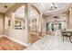 Elegant entryway featuring marble flooring, wood accents, and arched doorways leading to other living spaces at 433 Tangerine Ave, Lake Helen, FL 32744