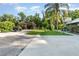 Spacious driveway leading to a covered outdoor structure perfect for entertaining at 433 Tangerine Ave, Lake Helen, FL 32744