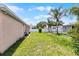 Green backyard providing ample space for outdoor activities and relaxation at 460 Flamingo Ct, Kissimmee, FL 34759