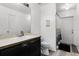 Compact bathroom featuring essential fixtures, vanity, and a simple design for functionality at 460 Flamingo Ct, Kissimmee, FL 34759