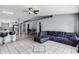 Open-concept living space with seamless access to kitchen and dining areas, perfect for entertaining at 460 Flamingo Ct, Kissimmee, FL 34759