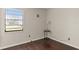 Cozy bedroom featuring wood floors, natural light, and a serene setting at 4643 Fern Pine Dr, Orlando, FL 32808