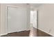 Bedroom showcasing a spacious closet with wood floors and natural light at 4643 Fern Pine Dr, Orlando, FL 32808