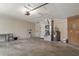 Spacious two car garage interior with workbench, water heater, and plenty of room for storage at 4643 Fern Pine Dr, Orlando, FL 32808