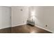 Inviting living room featuring a modern console table and sleek wood floors at 4643 Fern Pine Dr, Orlando, FL 32808