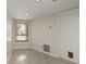 Neutral room with a window and tile flooring offers a versatile space at 4643 Fern Pine Dr, Orlando, FL 32808