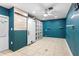Finished basement offering ample storage with custom built-ins and updated flooring at 5338 Tangerine Ave, Winter Park, FL 32792