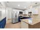 Modern kitchen featuring granite counters, stainless steel appliances, and two-tone cabinets at 5338 Tangerine Ave, Winter Park, FL 32792