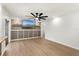 Bright living room featuring a modern ceiling fan, recessed lighting, and stylish decor at 5338 Tangerine Ave, Winter Park, FL 32792