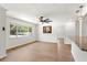 Bright living room boasts luxury vinyl plank flooring and ample natural light at 5338 Tangerine Ave, Winter Park, FL 32792