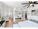 Main bedroom boasts an en-suite bath and large mirrored closet doors at 5338 Tangerine Ave, Winter Park, FL 32792