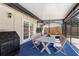 Covered patio with dining table and chairs, ideal for outdoor entertaining and relaxation at 5338 Tangerine Ave, Winter Park, FL 32792