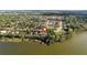 Waterfront community near tree-lined neighborhood and lake at 557 Lake Cove Pointe Cir, Winter Garden, FL 34787