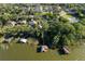 Waterfront homes feature private docks for enjoying the lake at 557 Lake Cove Pointe Cir, Winter Garden, FL 34787
