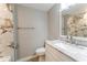Contemporary bathroom features marble tile shower, white vanity, and modern fixtures at 635 San Lanta Cir, Sanford, FL 32771