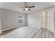 Bedroom featuring a ceiling fan, window, and light-colored floors at 635 San Lanta Cir, Sanford, FL 32771