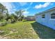 The backyard features a well-maintained lawn at 642 Carver Dr, Lake Wales, FL 33853