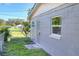 House exterior features a fenced yard, privacy and a modern exterior at 642 Carver Dr, Lake Wales, FL 33853