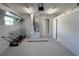 A bright and clean two car garage has fresh paint and an automatic garage door opener at 642 Carver Dr, Lake Wales, FL 33853