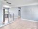 Open-concept design showcases tiled floors and a convenient breakfast bar connecting the living area to the kitchen at 642 Carver Dr, Lake Wales, FL 33853