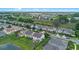 Aerial view of a residential neighborhood showcasing well-maintained homes, green lawns, and community landscaping at 646 Marsh Reed Dr, Winter Garden, FL 34787