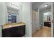Bathroom with a single sink vanity, tile floor and a shower-tub combo at 646 Marsh Reed Dr, Winter Garden, FL 34787