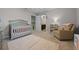 Comfortable Bedroom featuring soft carpeting and natural lighting at 646 Marsh Reed Dr, Winter Garden, FL 34787