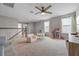 Large bonus room with a ceiling fan, neutral walls, and plenty of natural light at 646 Marsh Reed Dr, Winter Garden, FL 34787