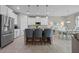 Modern kitchen with stainless steel appliances, granite countertops, and an open layout at 646 Marsh Reed Dr, Winter Garden, FL 34787