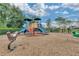 Colorful community playground with various play structures, providing a fun and safe environment for children at 646 Marsh Reed Dr, Winter Garden, FL 34787