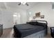 Bedroom features an ensuite bathroom and comfortable furnishings at 725 N Grandview Ave, Daytona Beach, FL 32118