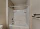 Bright bathtub and shower combination at 7806 Tanbier Dr, Orlando, FL 32818