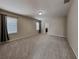 Spacious main bedroom with carpeting and a doorway into the en suite bathroom at 7806 Tanbier Dr, Orlando, FL 32818
