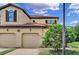 Charming two-story home with a two-car garage and well-maintained landscaping at 8124 Roseville Rd, Davenport, FL 33896