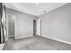 Bedroom featuring neutral walls, carpeted floor, and doorways at 8226 Nemours Pkwy, Orlando, FL 32827