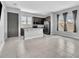 Modern kitchen with stainless steel appliances, a center island, and ample natural light at 8226 Nemours Pkwy, Orlando, FL 32827