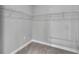 Spacious walk-in closet with shelving provides ample storage at 8226 Nemours Pkwy, Orlando, FL 32827