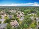 Neighborhood aerial view, showcasing homes with tree coverage at 8606 Port Said St, Orlando, FL 32817