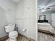 Bathroom with a toilet, and views to the bedroom at 8606 Port Said St, Orlando, FL 32817