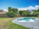 A private backyard pool with tranquil landscaping, perfect for relaxation and entertaining at 8606 Port Said St, Orlando, FL 32817