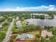 Aerial view with the property lines outlined, showcasing the homes location near the lake at 8606 Port Said St, Orlando, FL 32817