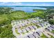A beautiful aerial shot of a lakeside community with manicured lawns at 1123 Dora Parc Ln, Mount Dora, FL 32757