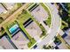 An aerial view showcases backyard pools in a residential neighborhood at 1123 Dora Parc Ln, Mount Dora, FL 32757