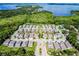 An aerial perspective captures a lakeside community with well-kept homes at 1123 Dora Parc Ln, Mount Dora, FL 32757